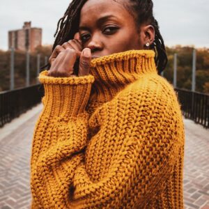 High neck drop hem sweater